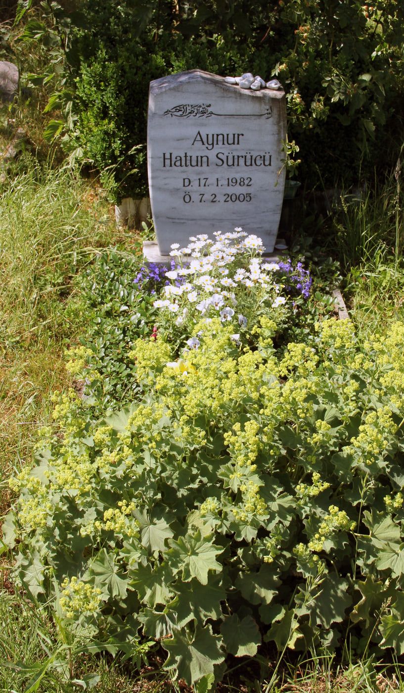 Planted grave of Aynur Hatun Sürücü with a pale headstone at Gatow Landscape Cemetery